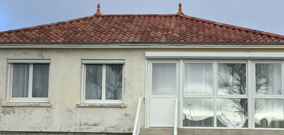 Façade d'une maison avant l'intervention de Abbs Habitat